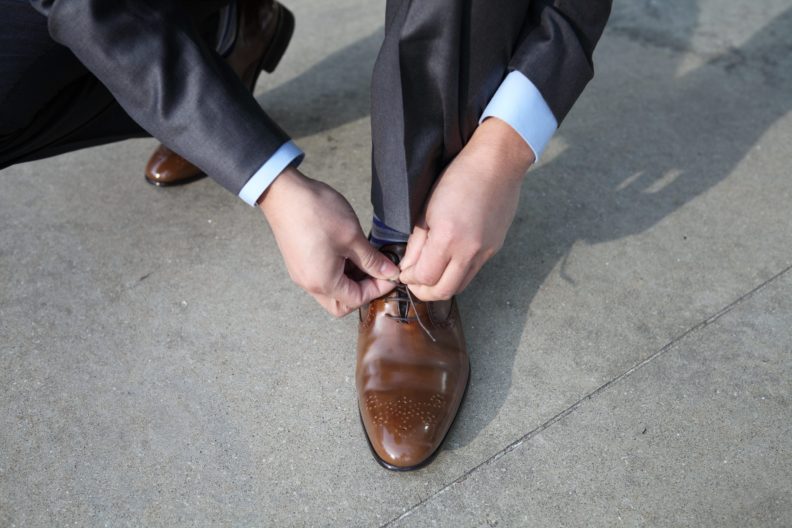 Image for City dress code ties graduates in knots